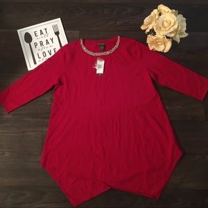 Chelsea and Theodore red rhinestone sweater.